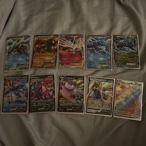 Pokémon cards includes 5 ex, 4 v, and one vmax